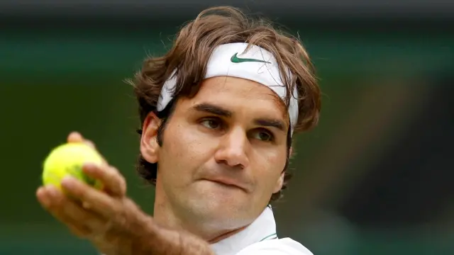Tennis: Federer shines on Centre Court