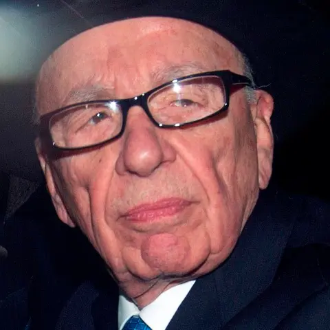 Murdoch quits boards of British papers