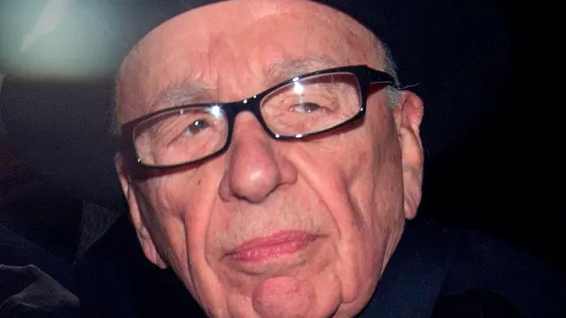 Murdoch quits boards of British papers