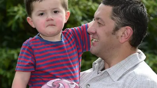 Father gives thanks for healthy boy