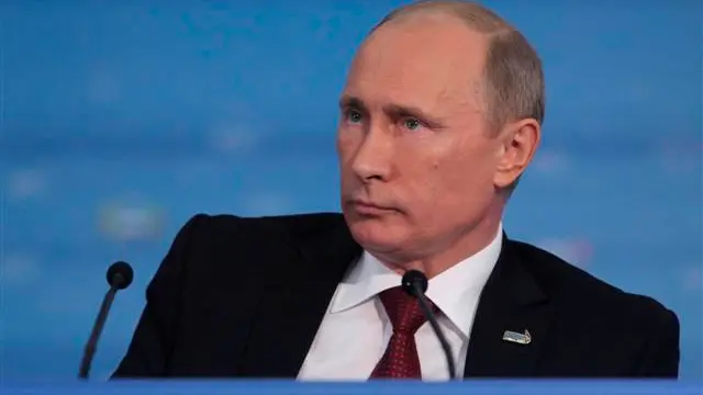 Putin tells soldiers to boost Russian defence