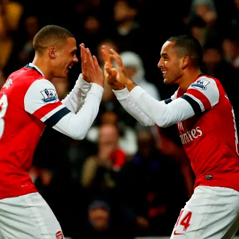 Football: Walcott bags three as Gunners go on spree