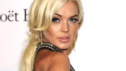 Lohan's probation revoked after car crash charges