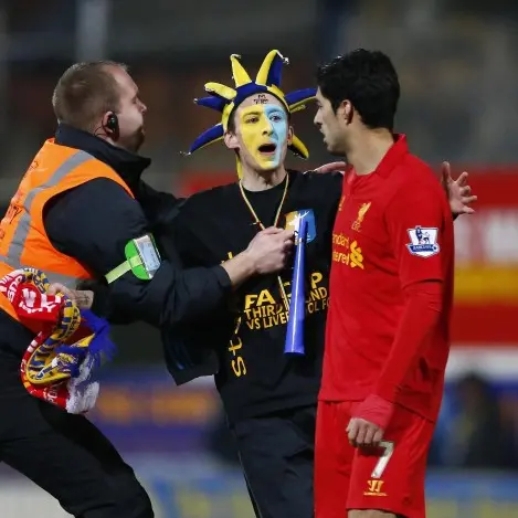 Football: Commentator reprimanded over Suarez 'cheat' comment
