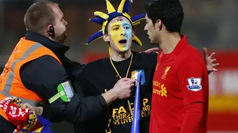 Football: Commentator reprimanded over Suarez 'cheat' comment