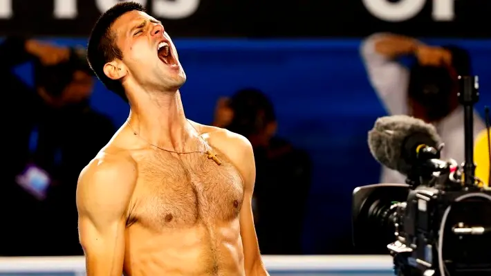 Tennis: Djokovic survives scare to advance to quarters