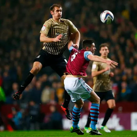 Football: Bradford stun Villa to make League Cup final