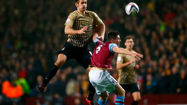 Football: Bradford stun Villa to make League Cup final