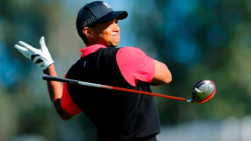 Golf: Woods triumphs by four shots at Torrey Pines