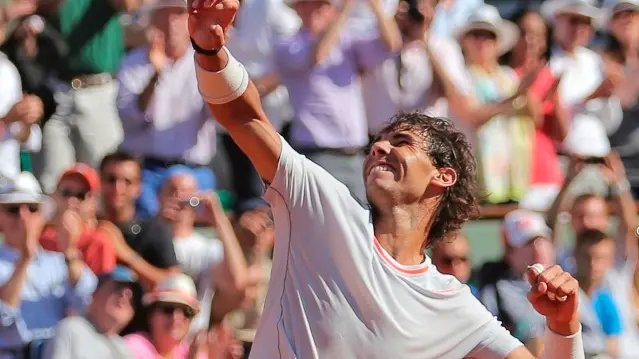 Tennis: Nadal edges Djokovic to reach final