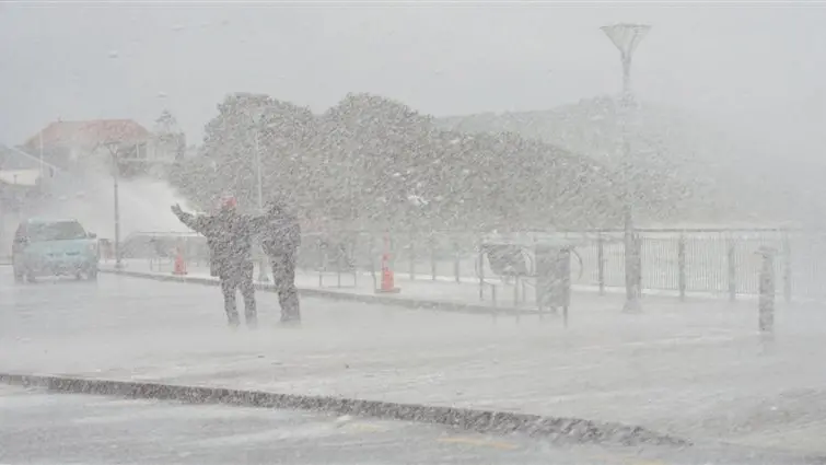 Storm showers St Clair with dirty white foam
