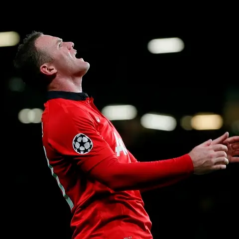 Football: Man United top group in Champs League