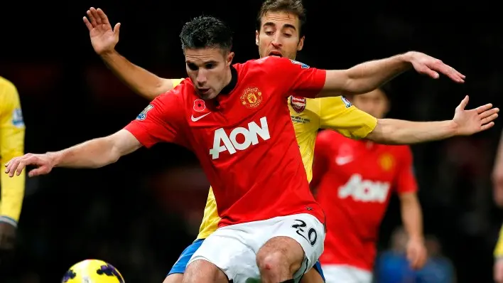 Football: Van Persie strikes as Man United sink Arsenal