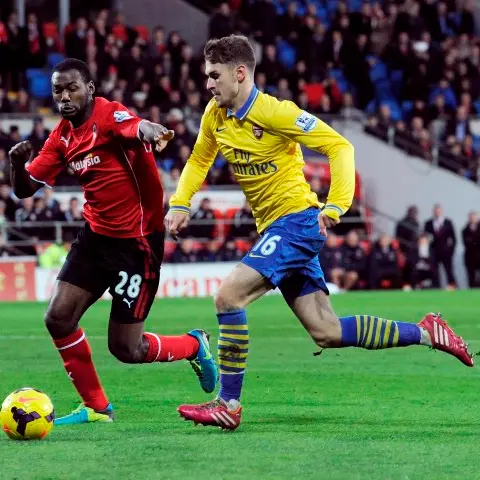 Football: Ramsey helps Arsenal go seven clear