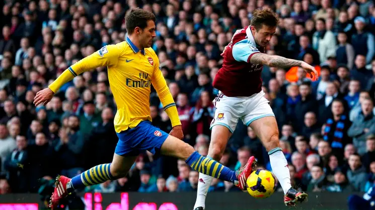 Football: Walcott double puts Arsenal back on top