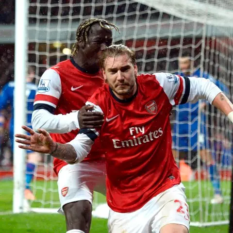 Football: Arsenal leave it late to beat Cardiff