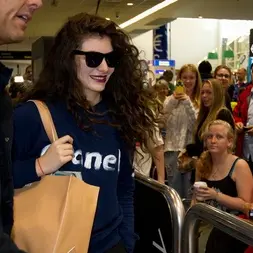 Lorde welcomed home by adoring fans