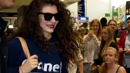 Lorde welcomed home by adoring fans