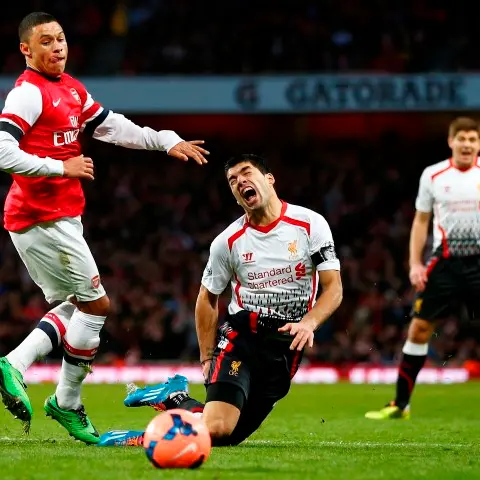 Football: Arsenal get revenge over Liverpool