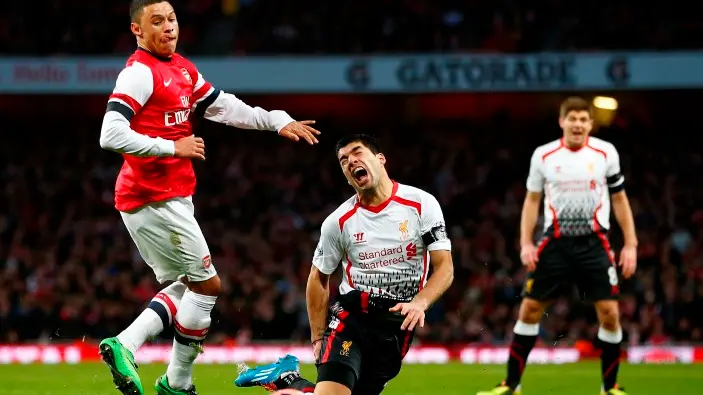 Football: Arsenal get revenge over Liverpool