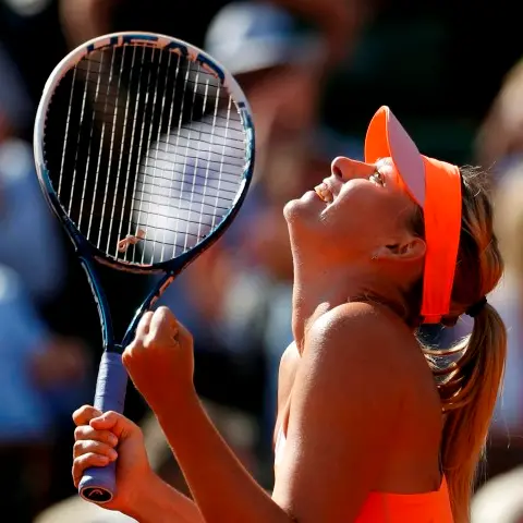 Tennis: Sharapova scraps way into French Open final
