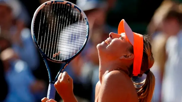 Tennis: Sharapova scraps way into French Open final