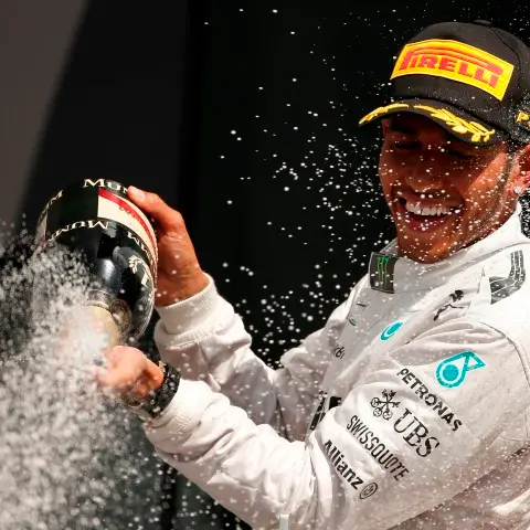 Motorsport: Hamilton triumphs in home GP