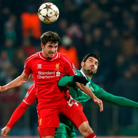 Football: Misfiring Liverpool hold on for draw