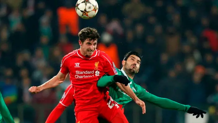 Football: Misfiring Liverpool hold on for draw