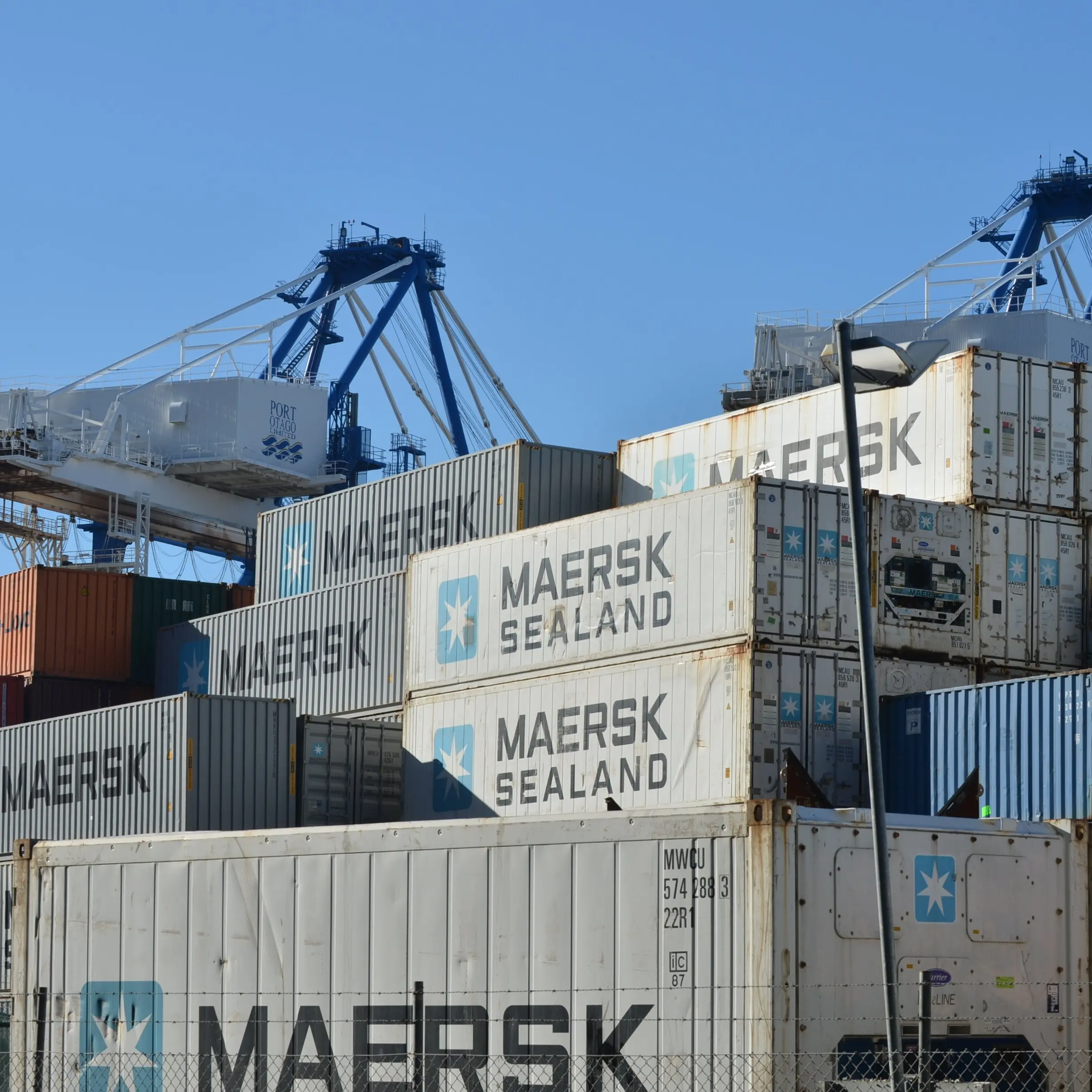 Train hits 2-tonne container blown on to track