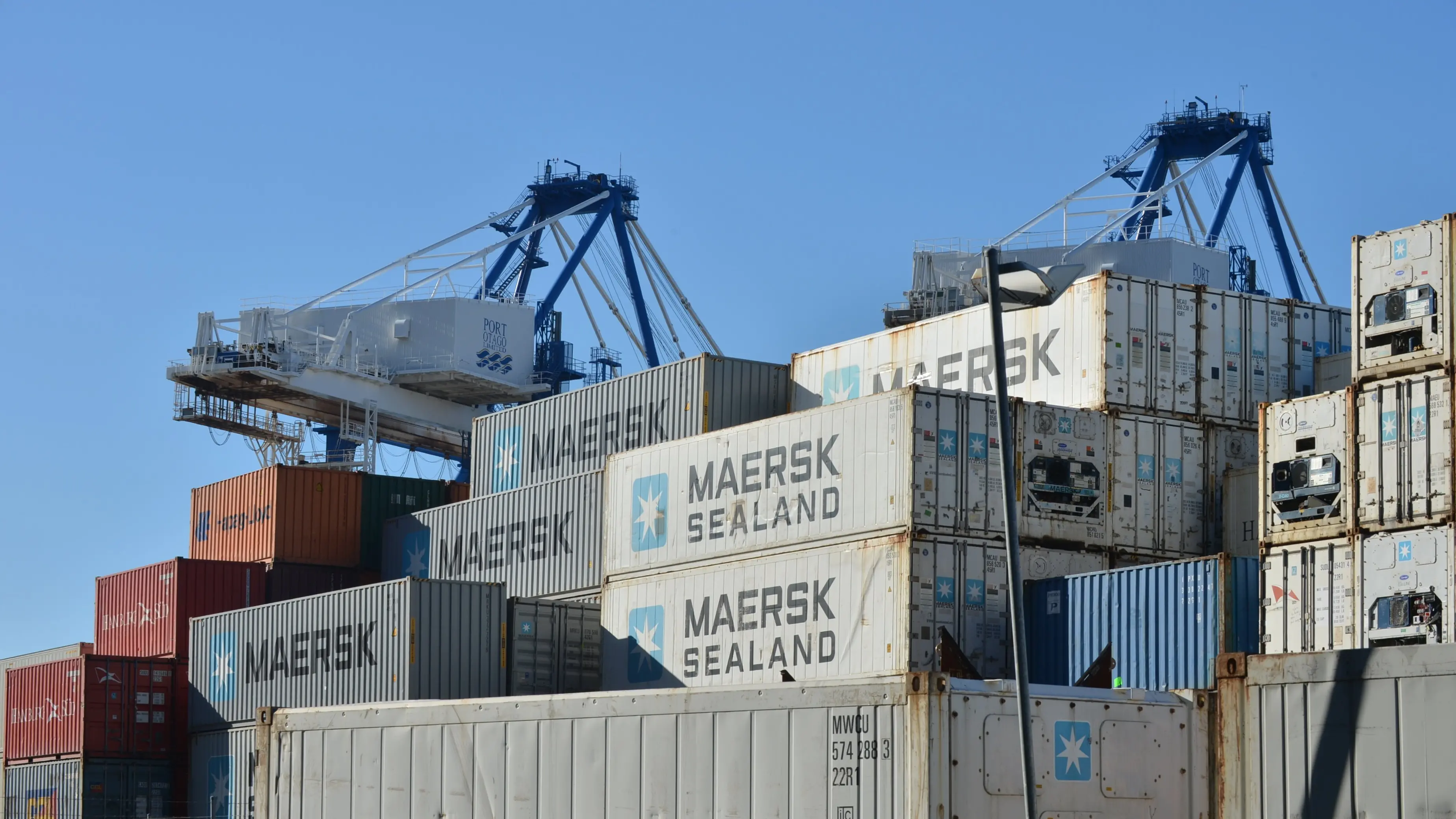 Train hits 2-tonne container blown on to track