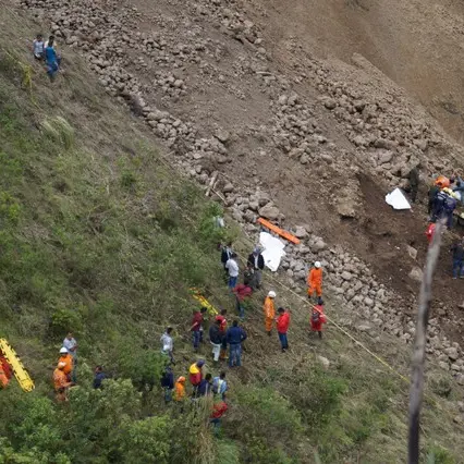 Several dead after landslide pushes bus into ravine