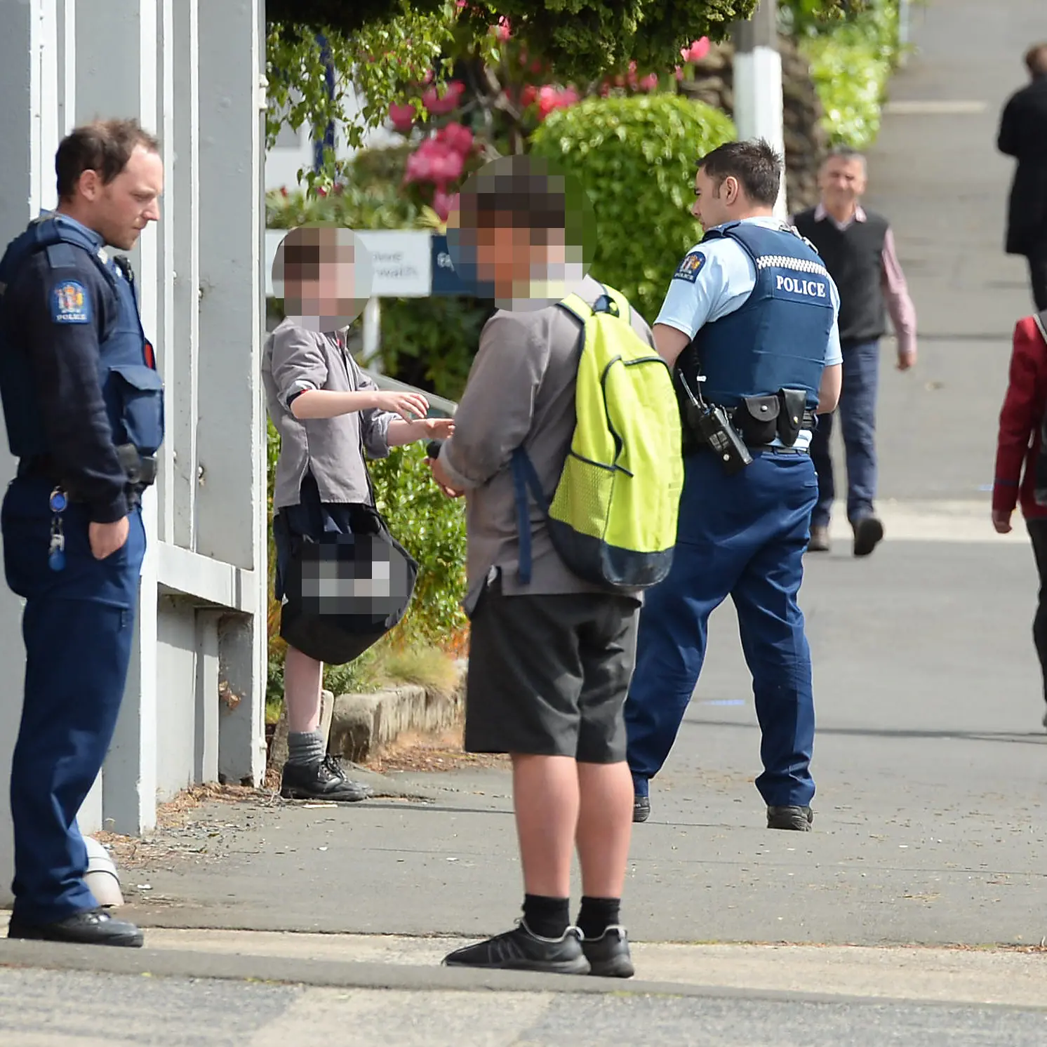 Boys spoken to after windows broken