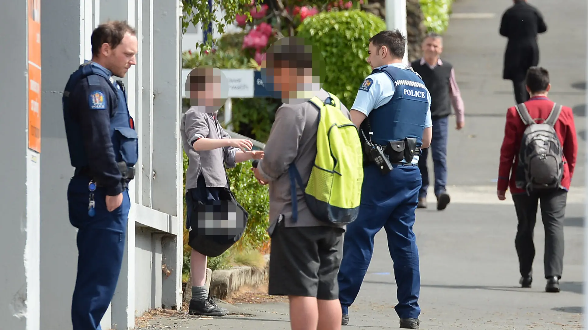 Boys spoken to after windows broken