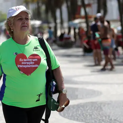 Woman gets Olympian's heart, vows to be active