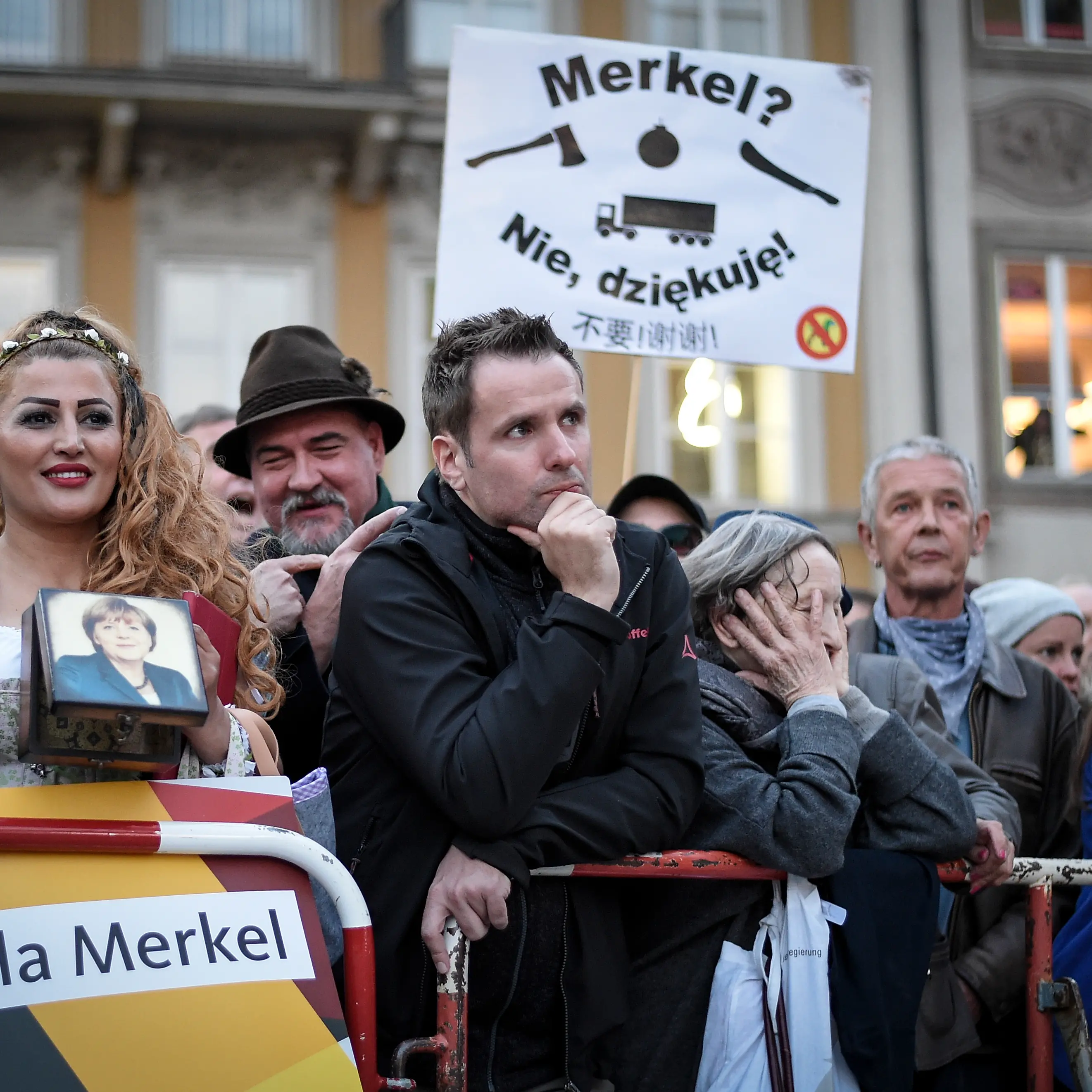 Germany votes as history beckons for Merkel, and far-right