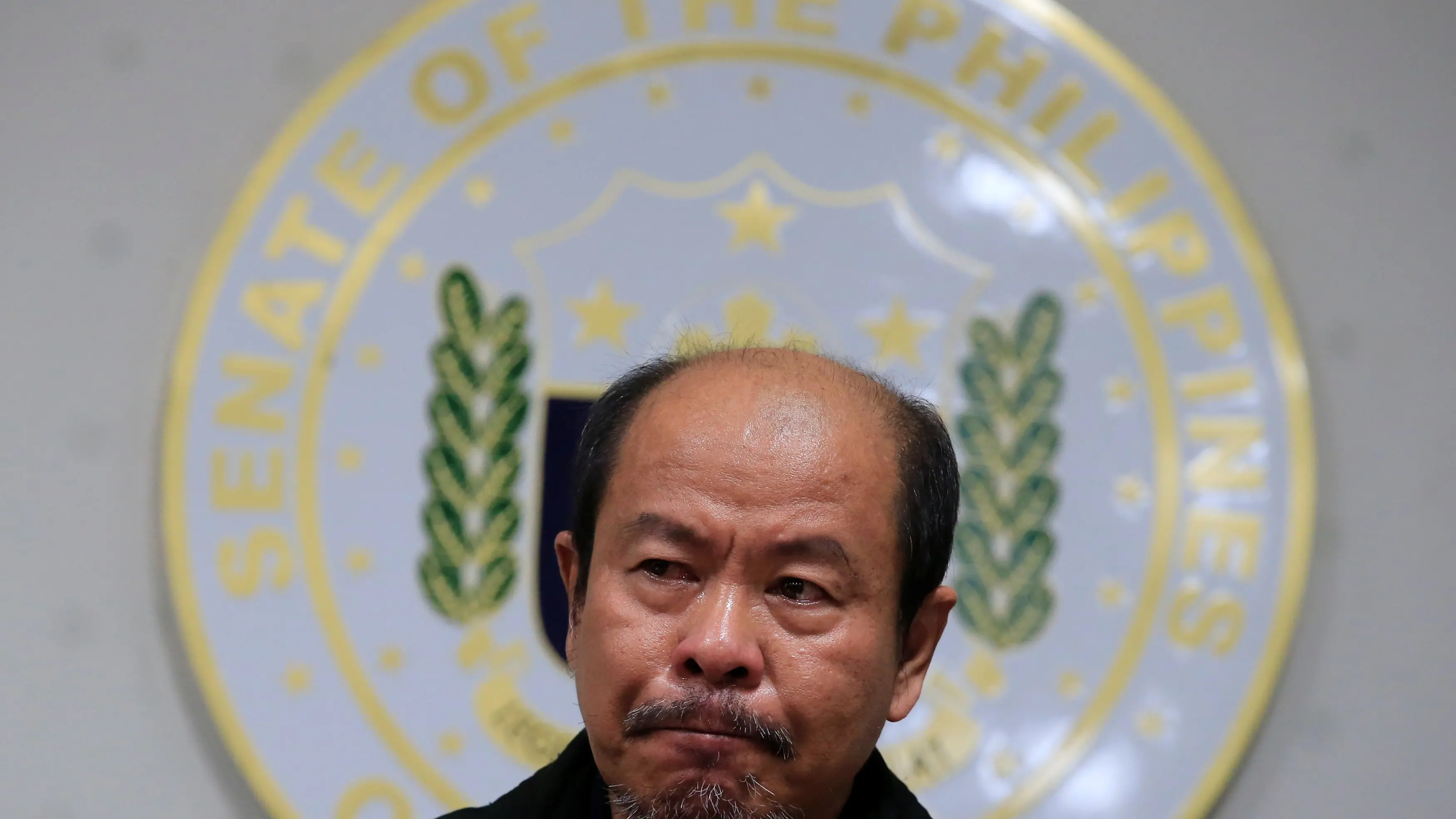 Retired policeman says worked for Duterte 'death squad'