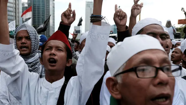 Jakarta to elect leader as religious tensions rise