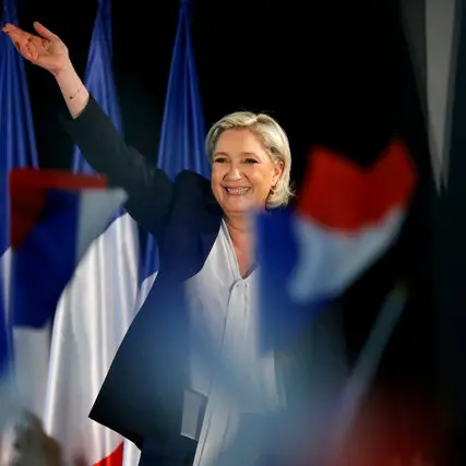Facing election defeat, Le Pen flip-flops on euro
