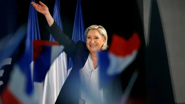 Facing election defeat, Le Pen flip-flops on euro