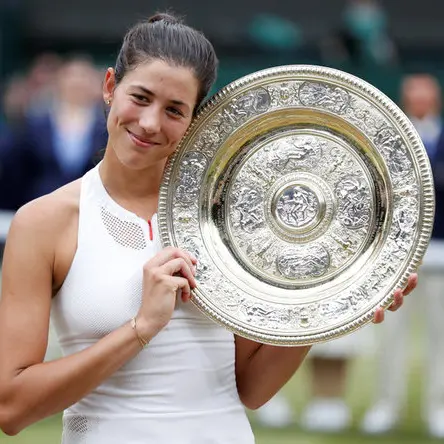 Muguruza blows away Venus to take first Wimbledon