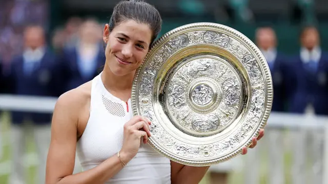Muguruza blows away Venus to take first Wimbledon