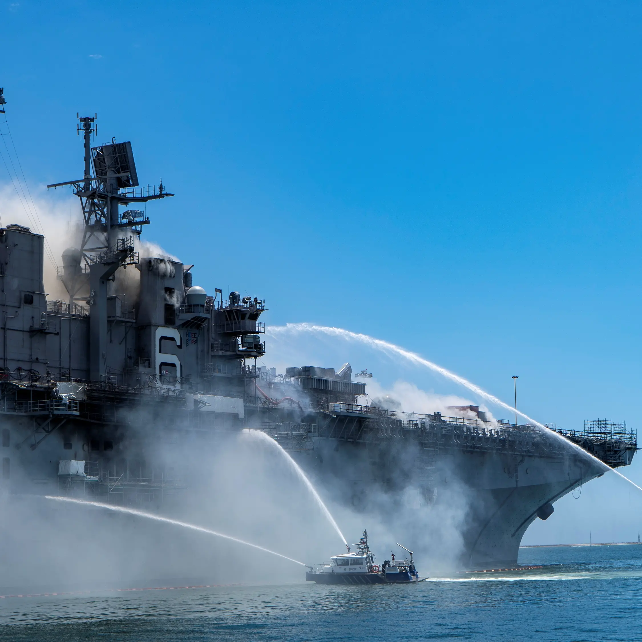 US Navy battles for second day to save burning warship