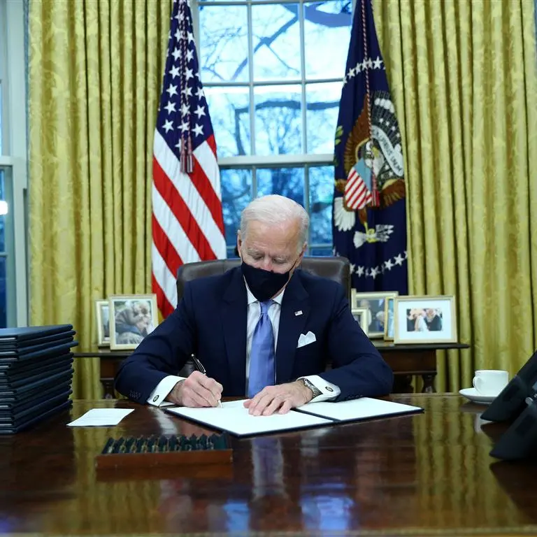Biden signs orders ending Trump policies