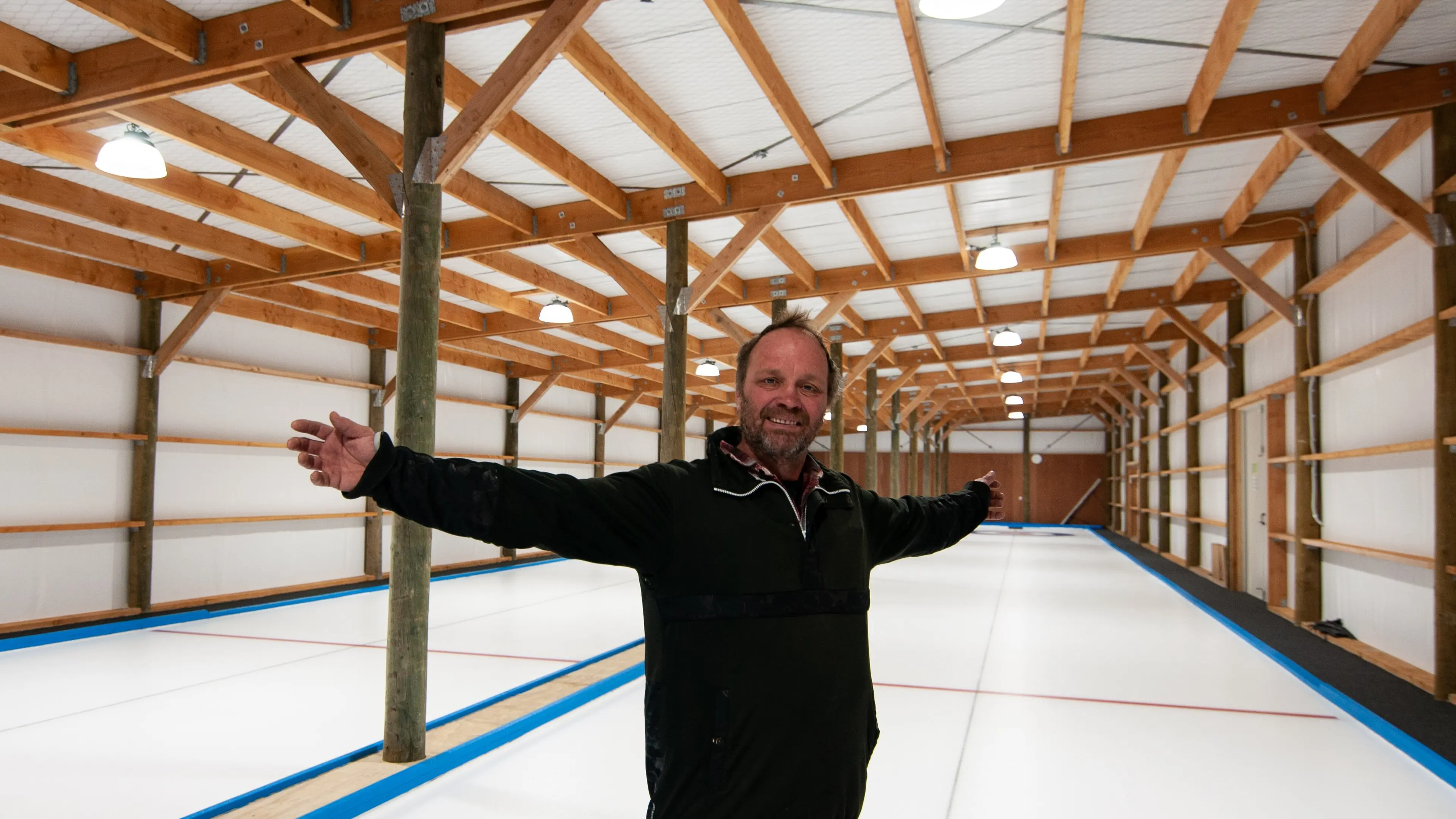 Two-lane indoor curling rink opening a success