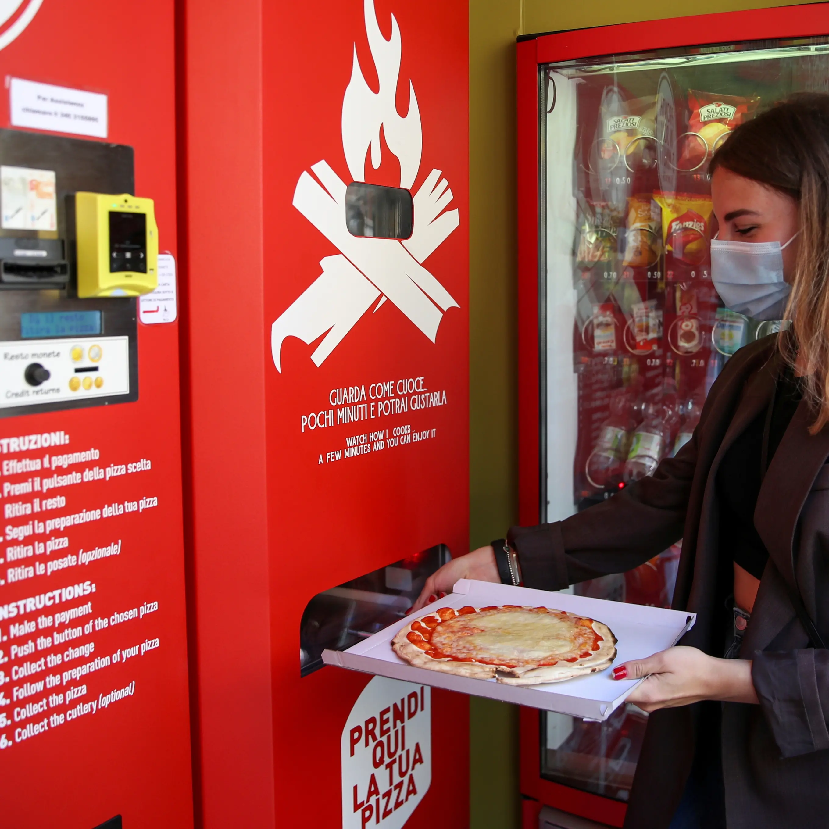 Fresh pizza vending machine prompts curiosity and horror in Rome