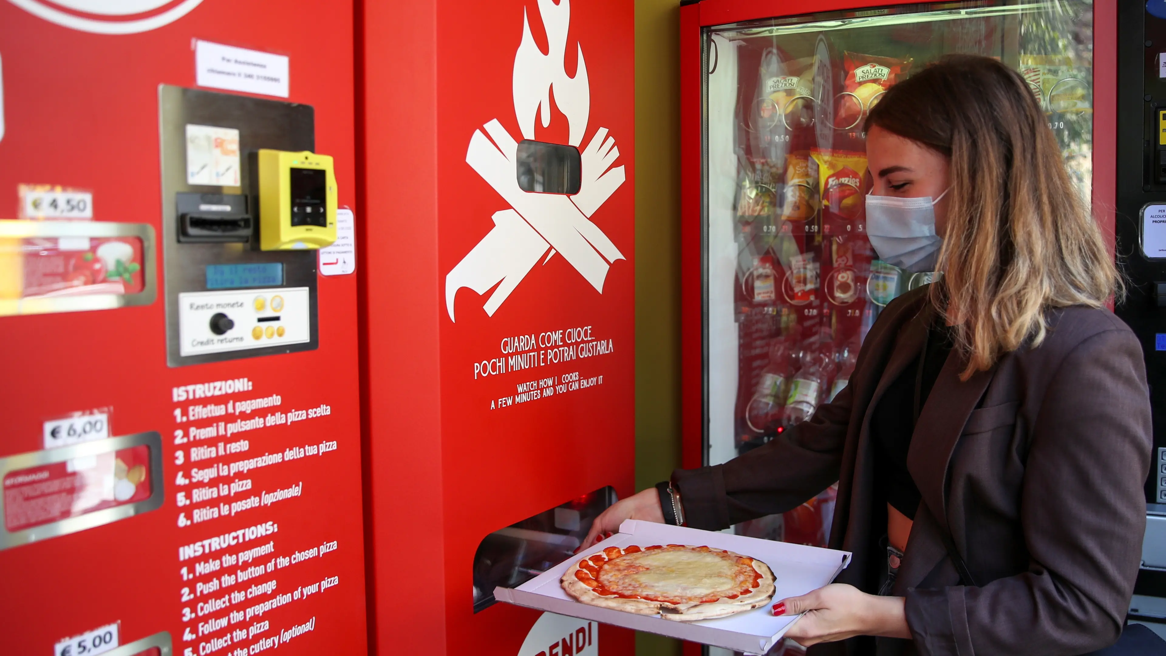 Fresh pizza vending machine prompts curiosity and horror in Rome