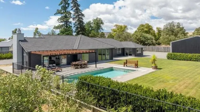 Auction room erupts as bidding war pushes home past $2m mark