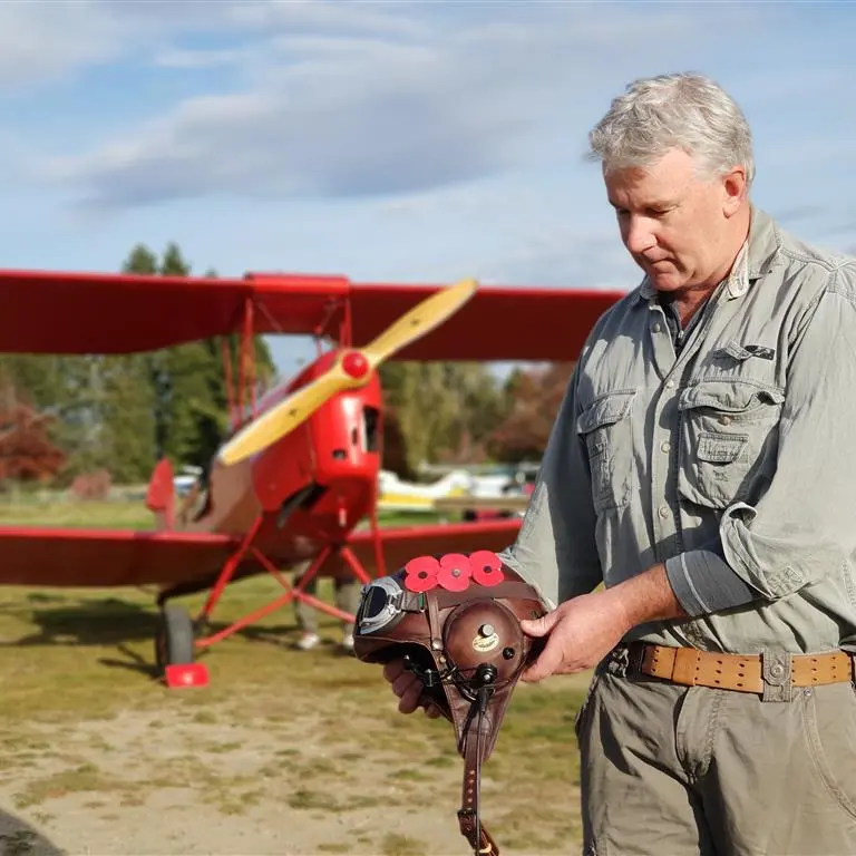 Three brothers among 17 honoured in poppy drop