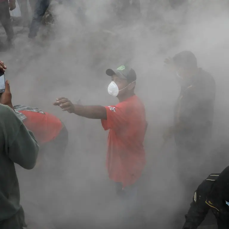Volcano search suspended as toll tops 100